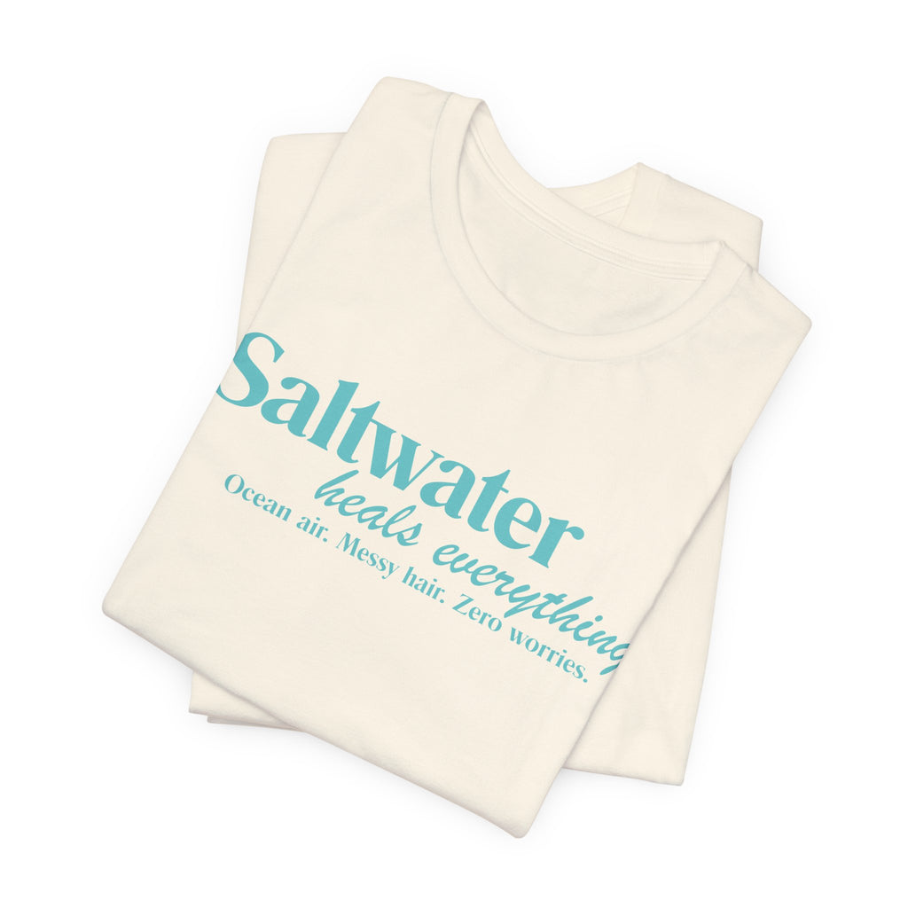 Saltwater Heals Everything Unisex Tee - Beachy Coastal Vacation Shirt Light Blue Letters