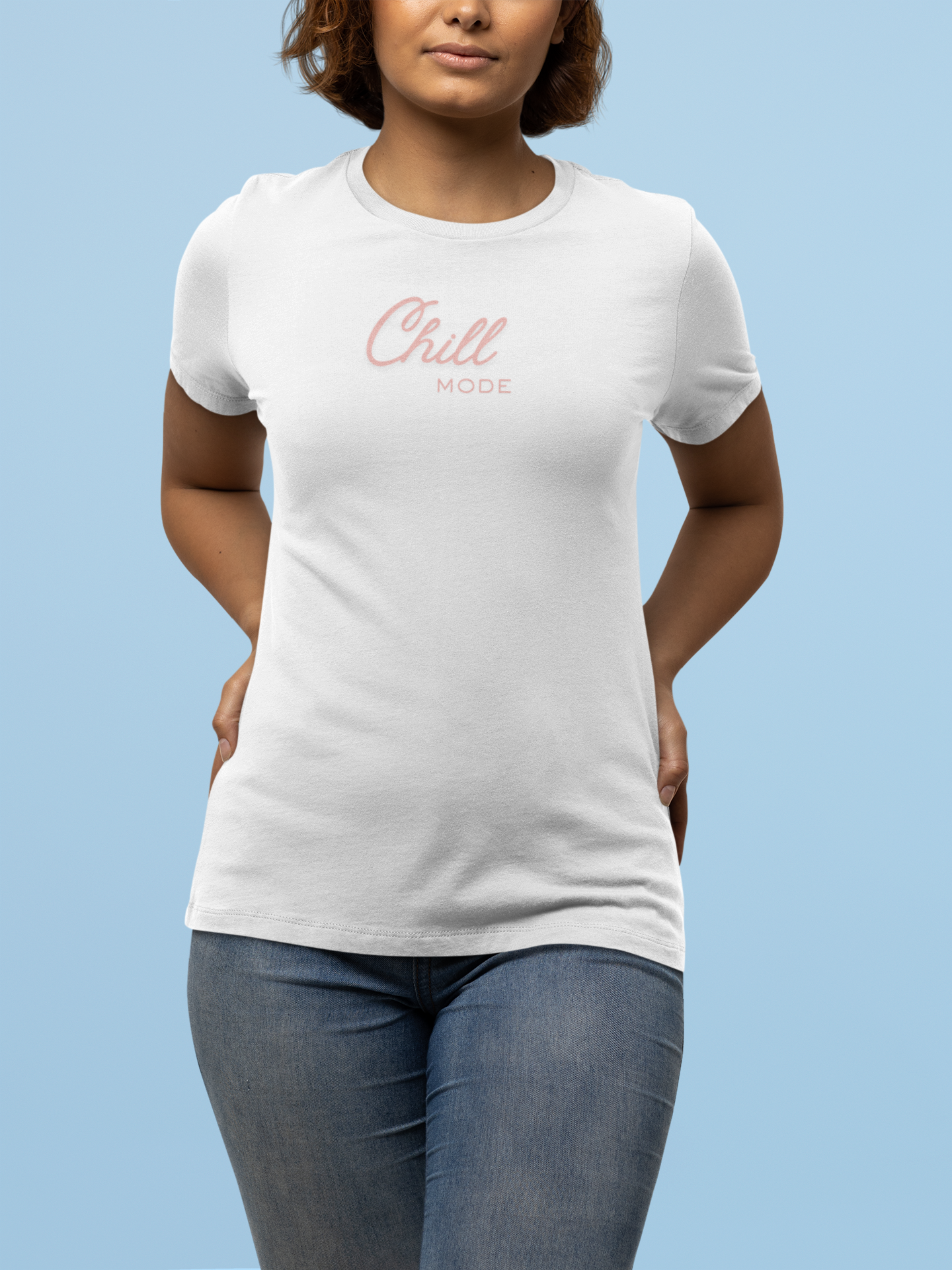 Person wearing a white t-shirt with 'Chill Mode' text on a light blue background