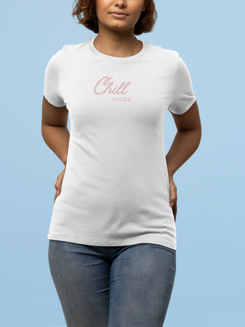 Person wearing a white t-shirt with 'Chill Mode' text on a light blue background