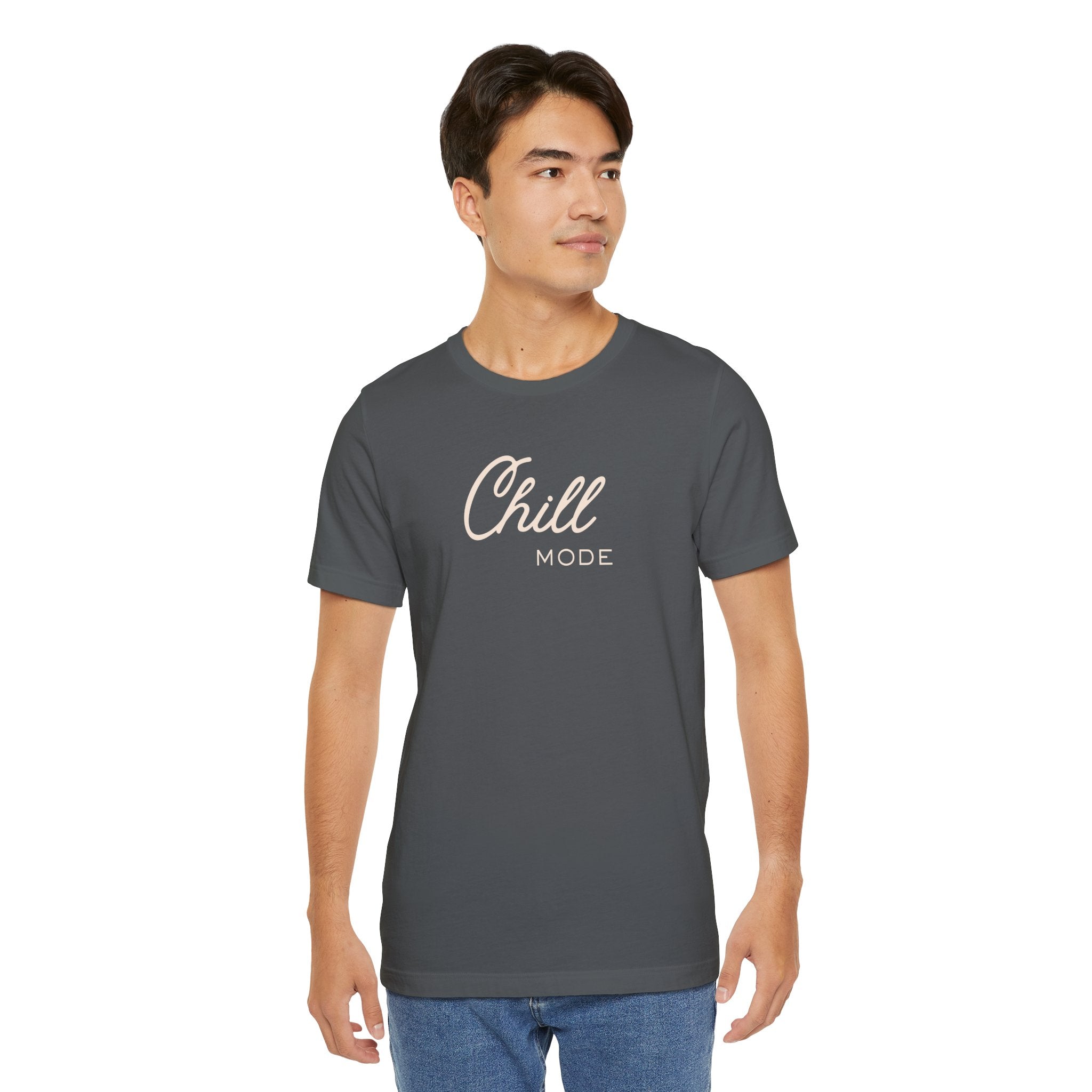 Man wearing a gray t-shirt with 'Chill Mode' text on a white background